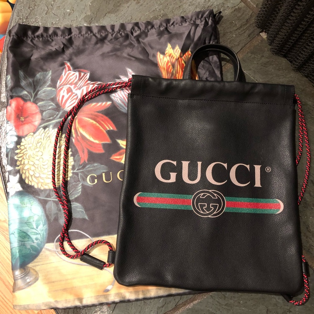 Gucci print leather drawstring backpack